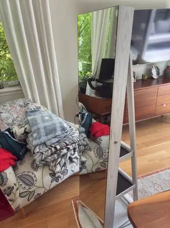 beautiful stand up mirror and jewelry cabinet