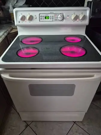 G/E glass top stove/Free Delivery