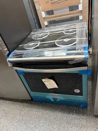 OPEN BOX STAINLESS STEEL RANGE WITH COIL BURNERS