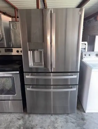 GE Stainless Steel Refrigerator And Freezer