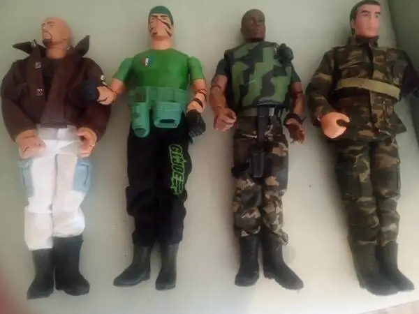 Four G.I. Joe Action Figures,  3 Rifles,  8 Helmets, Accessories