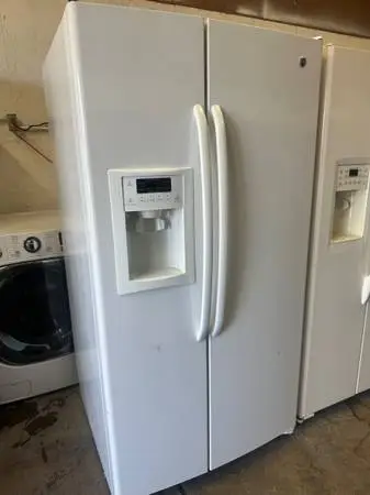Shiny white GE side-by-side water and icemaker can deliver