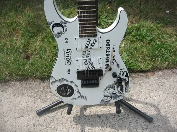 NEW LISTING.. WHITE OUIJABOARD ELECTRIC GUITAR.....ONLY $350
