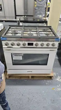 Brand new 36-in white and silver gas range