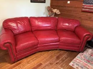 CUSTOM REAL RED LEATHER COUCH AND LEATHER EAMES CHAIR - ESTATE SALE