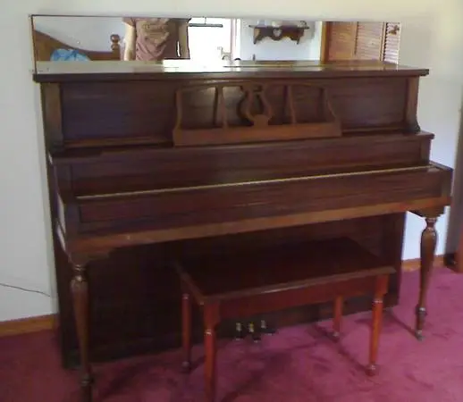 Antique Piano, 1879 casting, upright, in great shape.