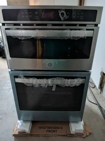 27 inch GE microwave wall oven combo. Brand new.