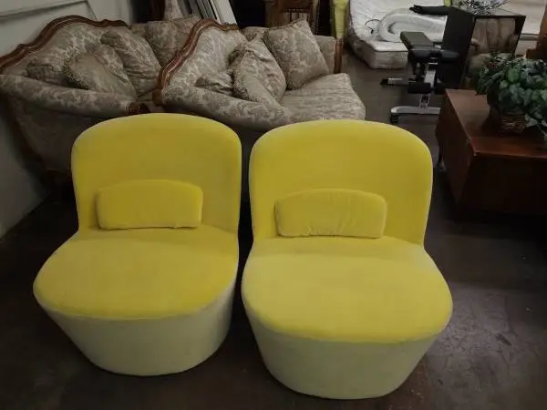 Retro Styled IKEA yellow swivel barrel chairs