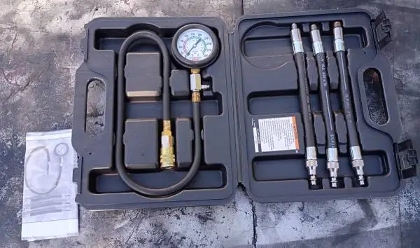 Engine compression tester