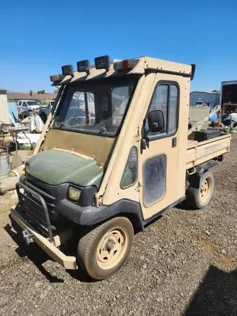 2003 Kawasaki kaf950 mule 4x4 tilt bed from airforce base
