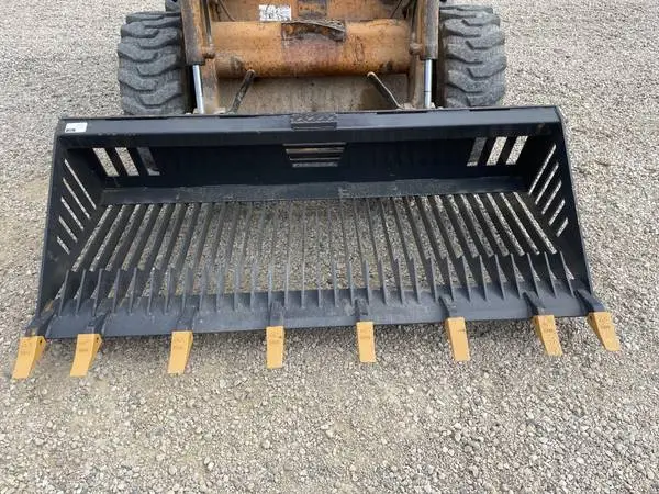 Skid steer rock bucket