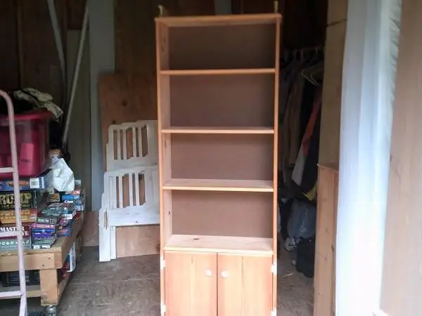 custom made book shelf cabinet with bottom doors
