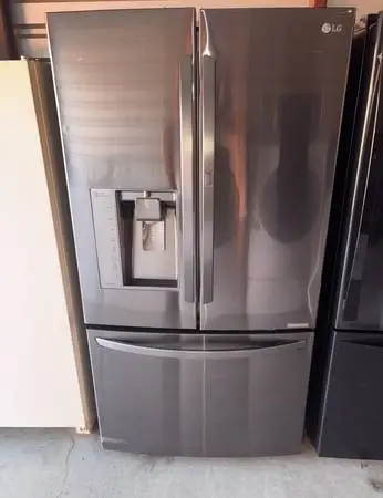 LG Dark Stainless Steel Refrigerator And Freezer
