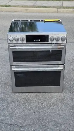 Brand new GE Cafe electric double oven induction range