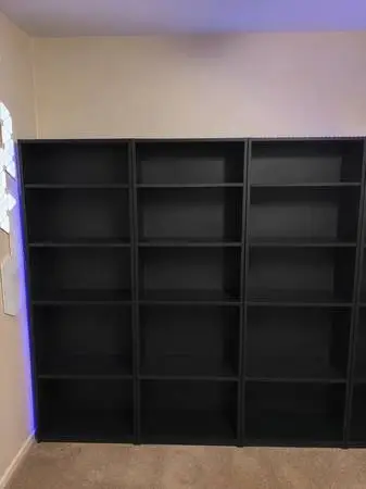 4 Black book cases w shelves