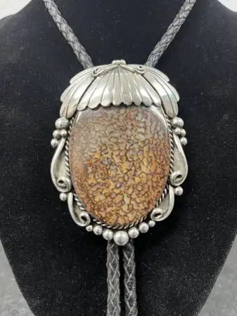 Stunning Sterling Silver and Agatized Dinosaur Bone Bolo Tie