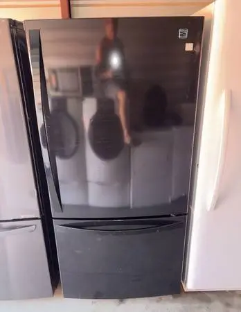 Black Kenmore Refrigerator And Freezer