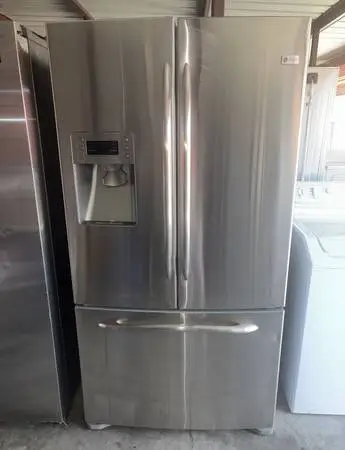 GE Stainless Steel Refrigerator And Freezer