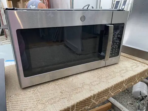 SS GE Microwave Oven 1.9 Cu Ft Model #JVM7195SK6SS Used