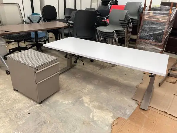 Over 100 electric sit / stand desks in stock starting at