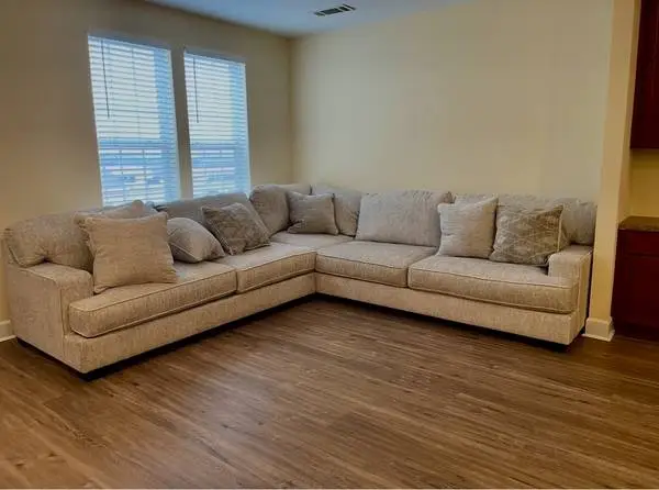 Ashley Furniture Rawcliffe Parchment 3-Piece Sectional.