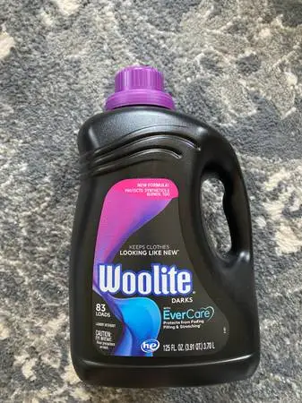 Woolite Darks laundry detergent with Evercare, brand new