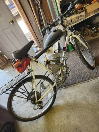 Vintage 2 cycle gasoline powered motorized bicycle.