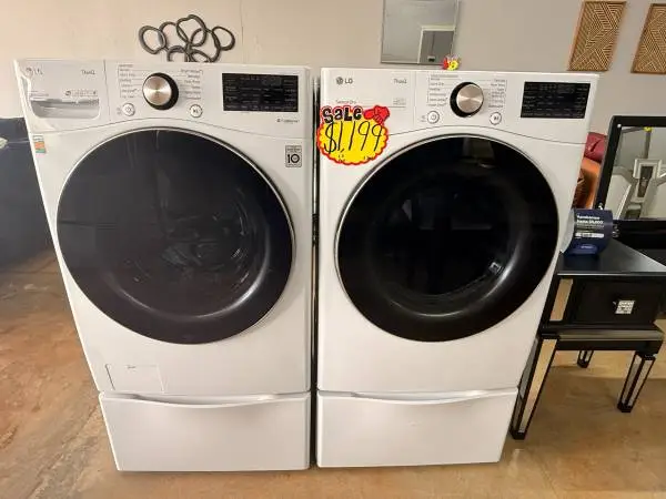Used White Tall LG Washer and Dryer Storage