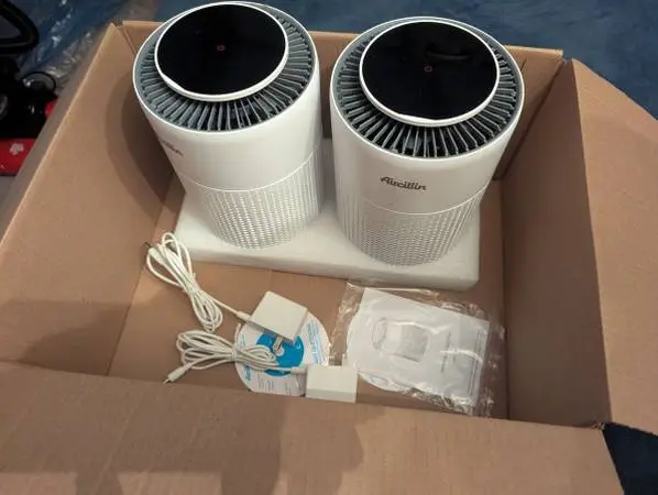 Two matching HEPA filter air filters