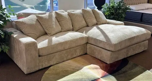 Sand Colored Corduroy Sectional With Reversible Chaise