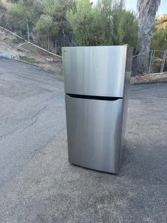 LG stainless steel refrigerator with freezer