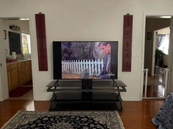 If it’s still listed, it’s still available. Modern black tempered glass TV
