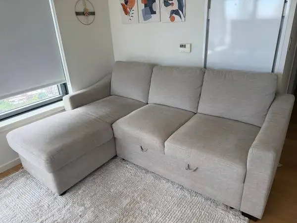 Sleeper couch with storage (2 yrs old)