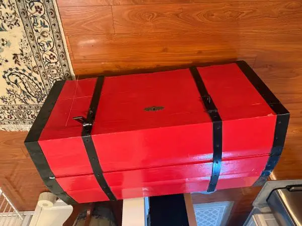 Red Storage Trunk with Wheels Very sturdy solid wood red storage trunk with bla