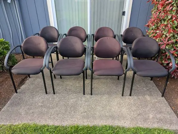 Eight Stackable Upholstered Chairs