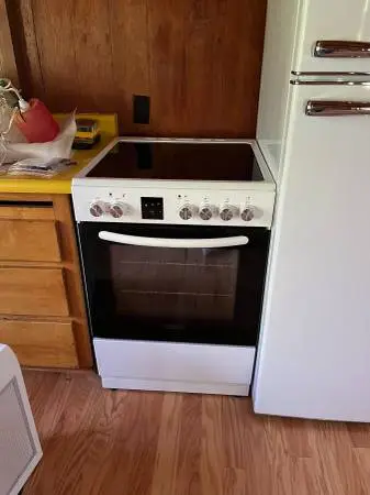 24 inch electric range with vent hood NEW