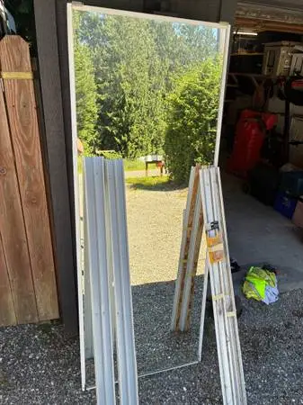 Four sliding glass doors with mirrors
