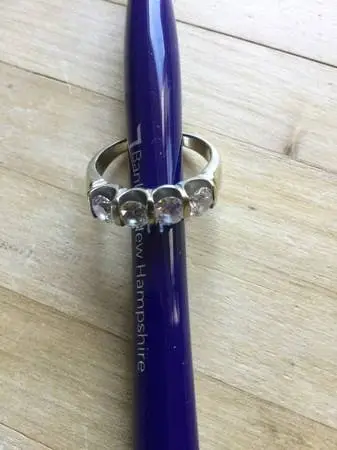4 STONE DIAMOND RING IS:1.38 Carrott +/-