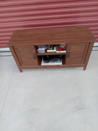 Wood entertainment TV cabinet,2 doors, 6 sections $ 50, good condition