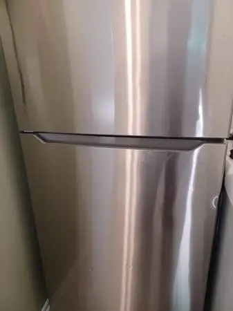 Stainless Refrigerator top freezer Like brand new 6 months warranty