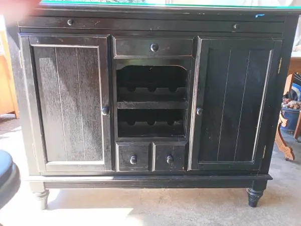 Distressed black wooden wine furniture