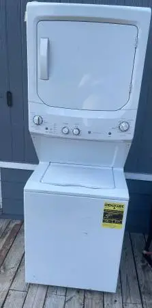 GE Washer and dryer stacked unit