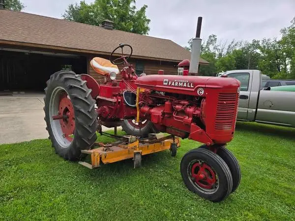 Farmall Super C tractor with belly mower
