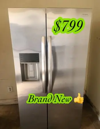 BRAND NEW side by side refrigerator .