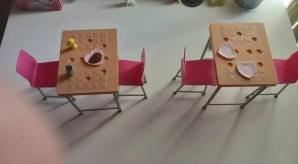 Barbie tables with chairs and kitchen accessories. Like new.