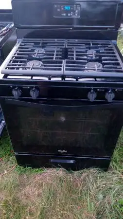 Whirlpool black gas stove $220.00