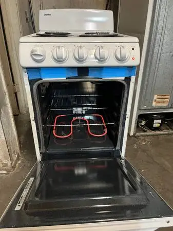 NEW CONDITION 20. INCH . COMPACT (( ELECTRIC 220V )) STOVE