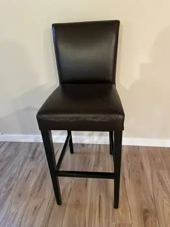 TWO dark brown bar chairs