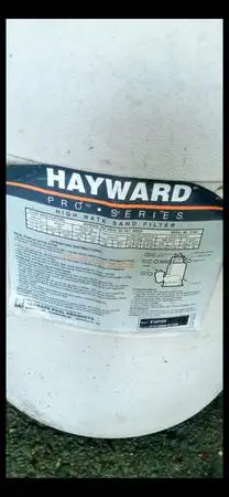 Used Hayward pool pump with attached sand filter and dial