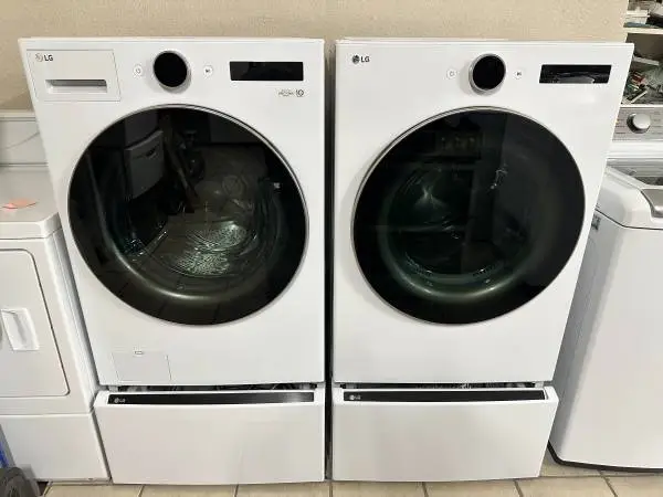 LG ThinQ washer & Electric dryer set w/ pedestals LIKE NEW W/ WARRANTY